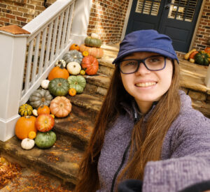 Savannah, founder of Pumpkinful Porch Designs, sharing the story behind her pumpkin decorating business.
