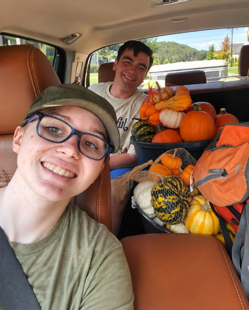 Workers with autism delivering pumpkins